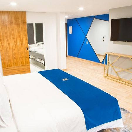 Rame Hotel Boutique Guadalajara Kültér fotó A bedroom at the hotel