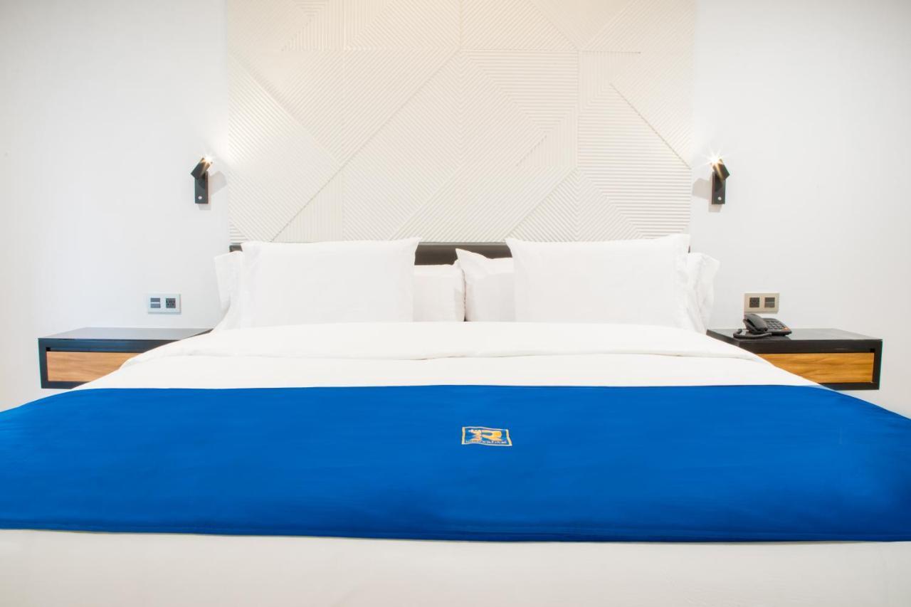 Rame Hotel Boutique Guadalajara Kültér fotó A bed at the hotel