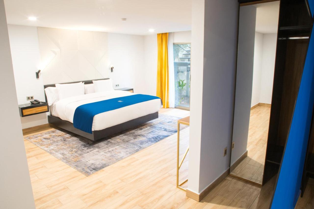 Rame Hotel Boutique Guadalajara Kültér fotó A bedroom at the hotel