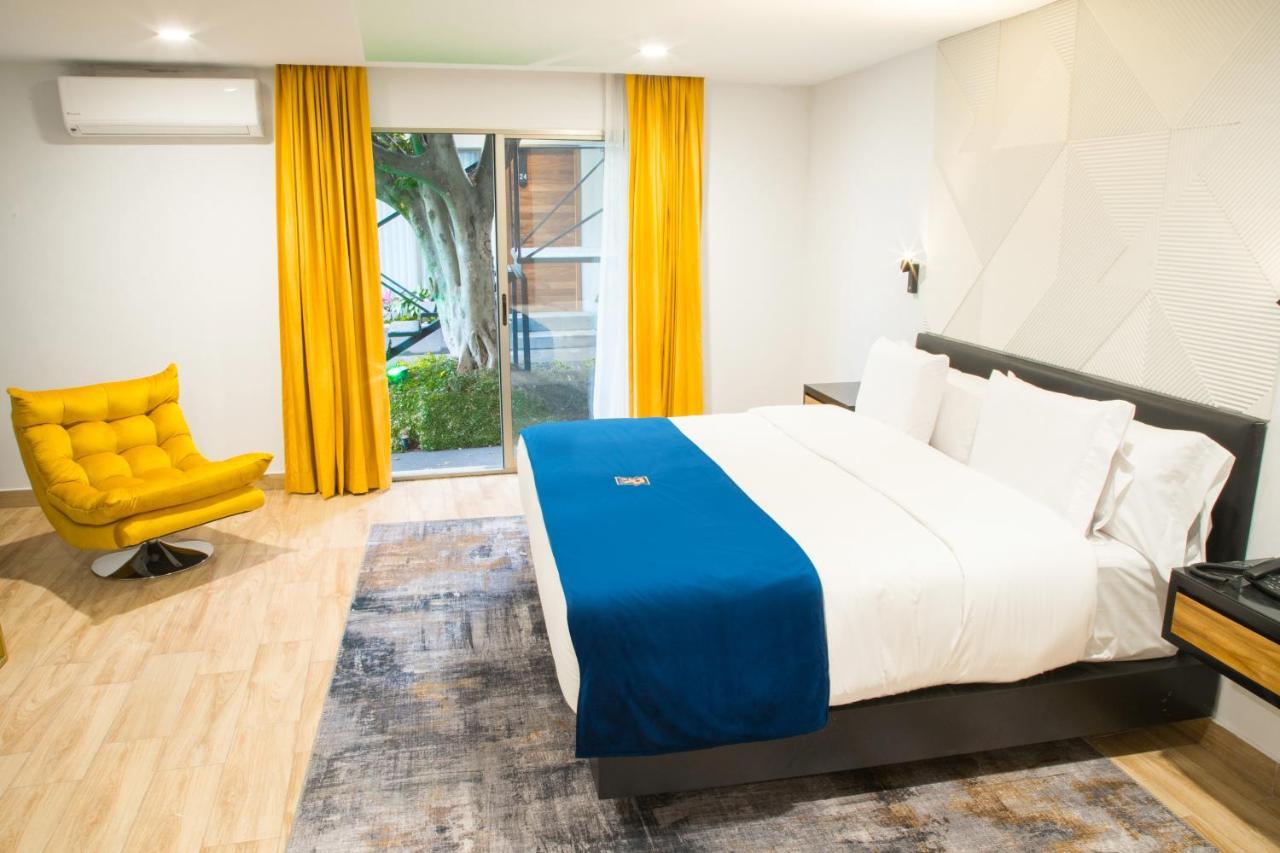 Rame Hotel Boutique Guadalajara Kültér fotó A room at the hotel