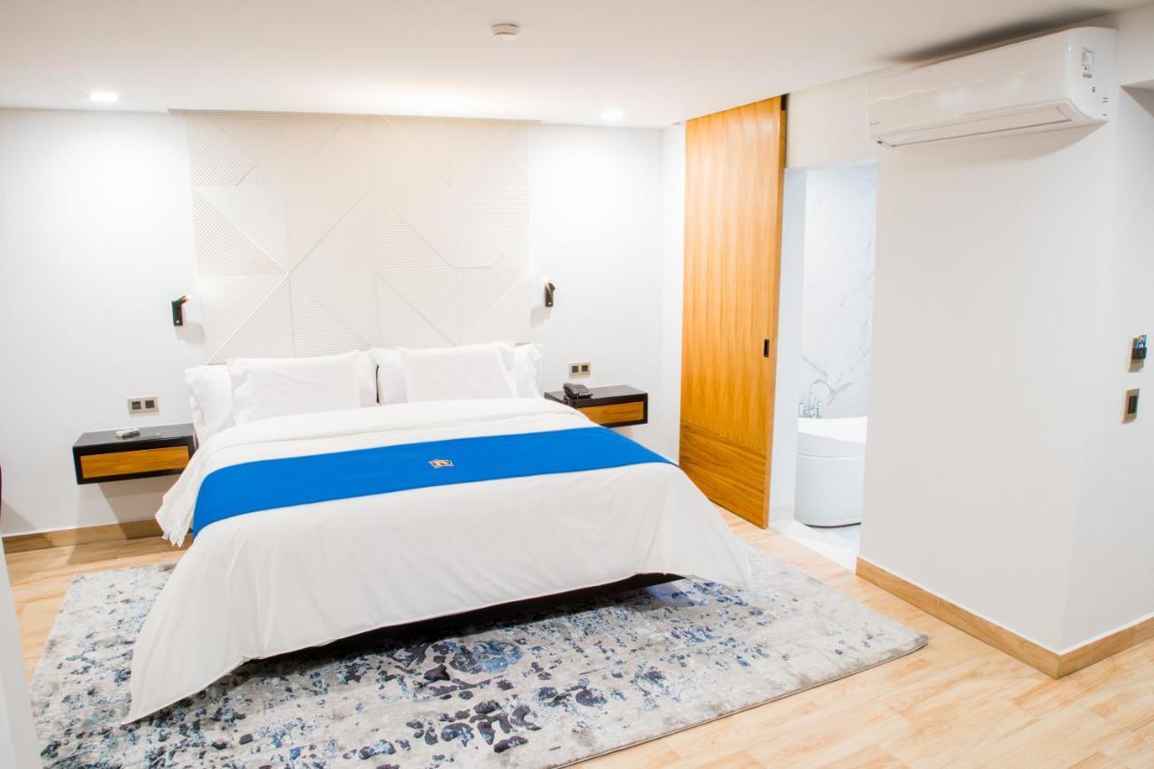 Rame Hotel Boutique Guadalajara Kültér fotó A bedroom at the hotel