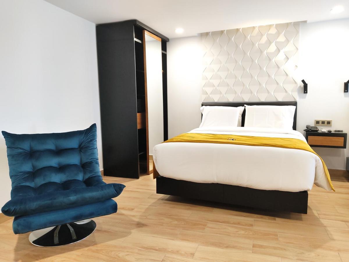 Rame Hotel Boutique Guadalajara Kültér fotó A bedroom in the hotel